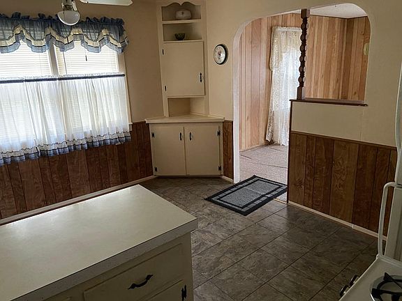 Dining area in kitchen (looking into living room).