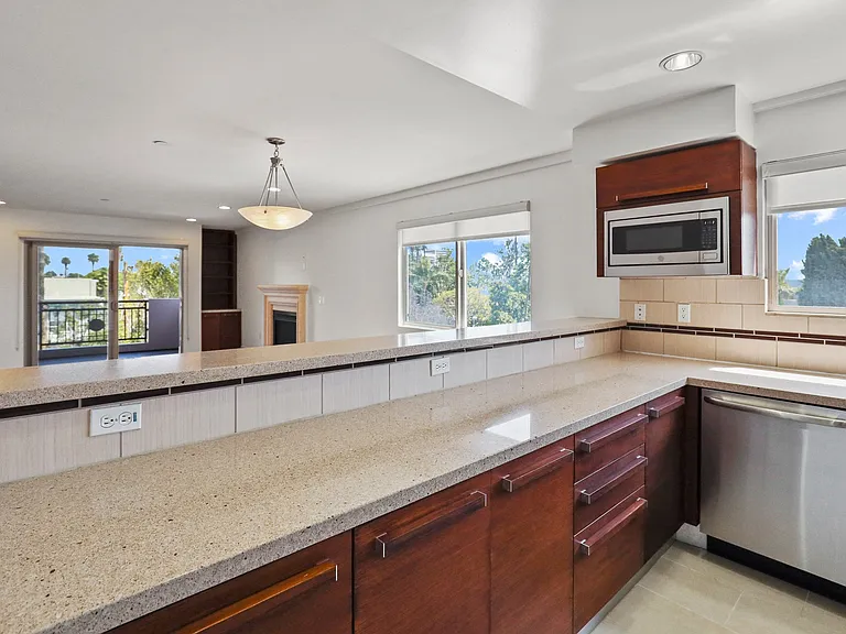 Open-Concept Kitchen, Dining, and Living Room Spaces