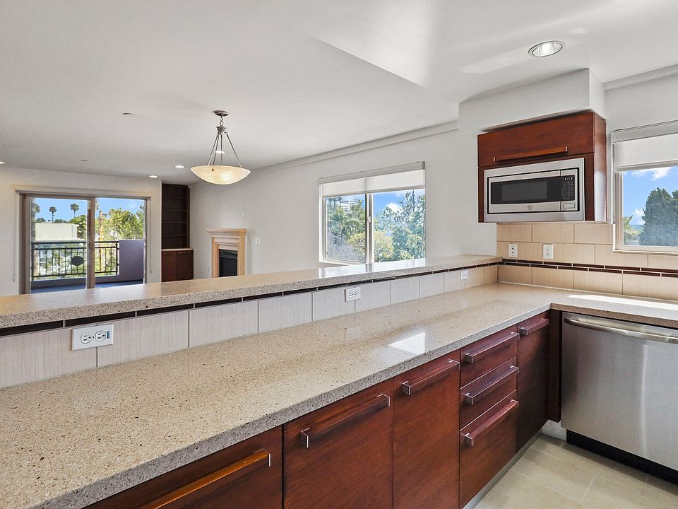 Open-Concept Kitchen, Dining, and Living Room Spaces