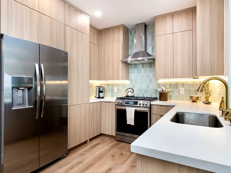 Stainless steel refrigerator with ice and filtered water in the door.