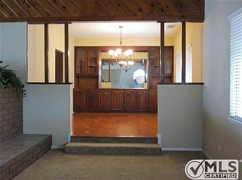 Living room dining room with built in hutch