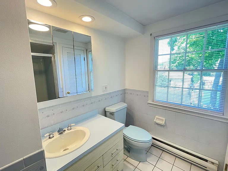 2nd-floor bathroom features an enormous linen closet (to the right in this image)