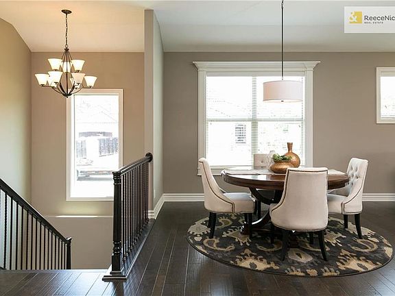 Large dining area for entertaining. Long-wearing sculptured staircase carpet and Mediterranean wrought iron style staircase spindles on the staircase is standard. Double-pane vinyl windows with low-e glass.