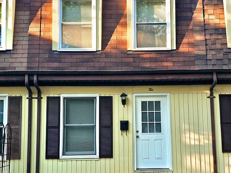 Front of townhome with brand new roofing!