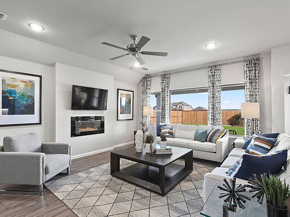 Living Room in the Oscar home plan by Trophy Signature Homes - REPRESENTATIVE PHOTO