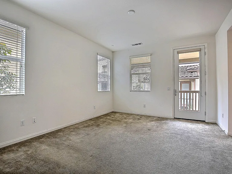 2nd Floor Primary Bedroom with Balcony Access