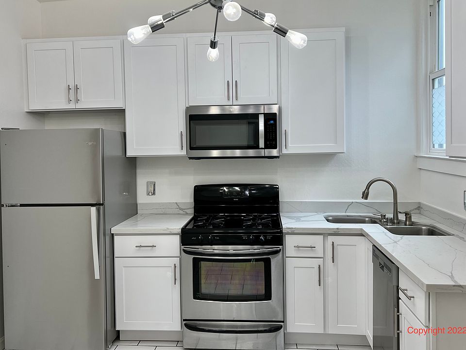 Kitchen. Updated with stainless steel refrigerator.