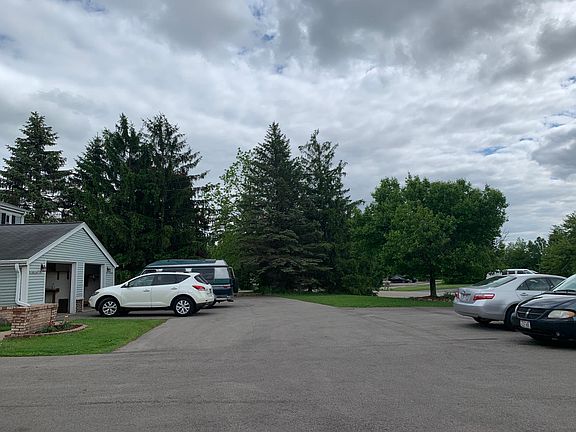 Rent includes an assigned second parking space in this large lot. Additional parking is available for an additional fee. The lot was newly resurfaced in 2018. Rent includes the lot being snow-plowed in winter.