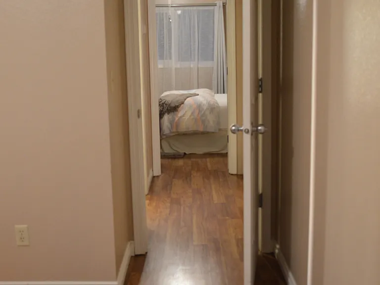 View from primary to second bedroom