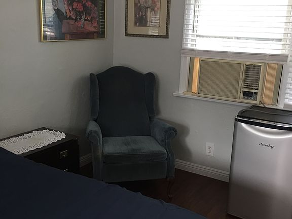 Side of the bed. Now on the wall I have a pantry next to the window.