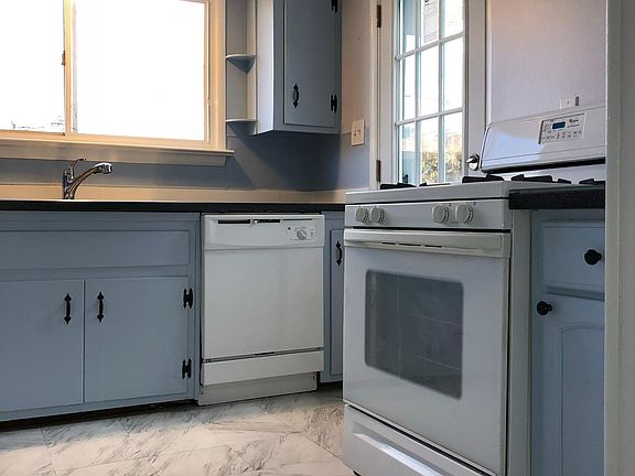 Kitchen with door to backyard