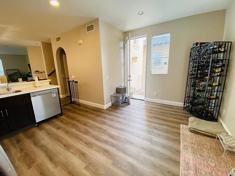 The kitchen is quite open and there is space for a small dining set or kitchen island/ butcher's block. There is also a small patio that opens off the kitchen were you can keep a BBQ grill.