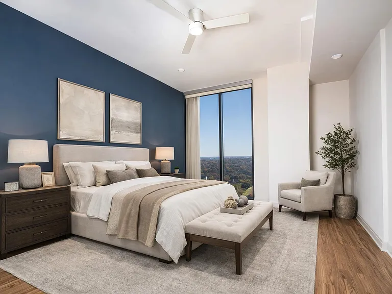 Penthouse bedrooms offer expansive layouts, floor-to-ceiling windows, and calming finishes that frame skyline views.