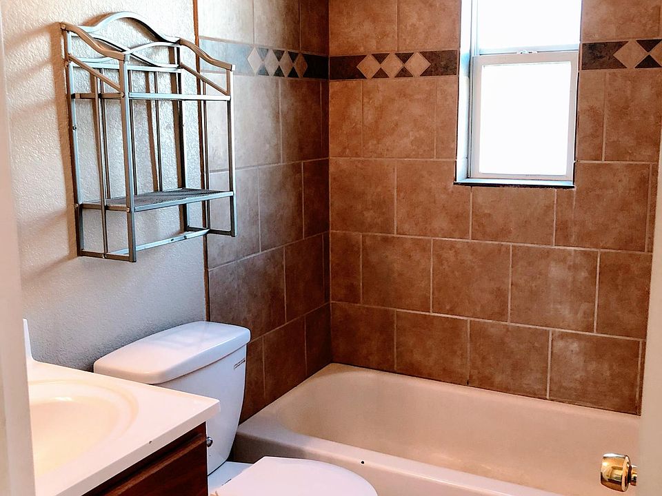 Recently updated bathroom with tile floors and shower