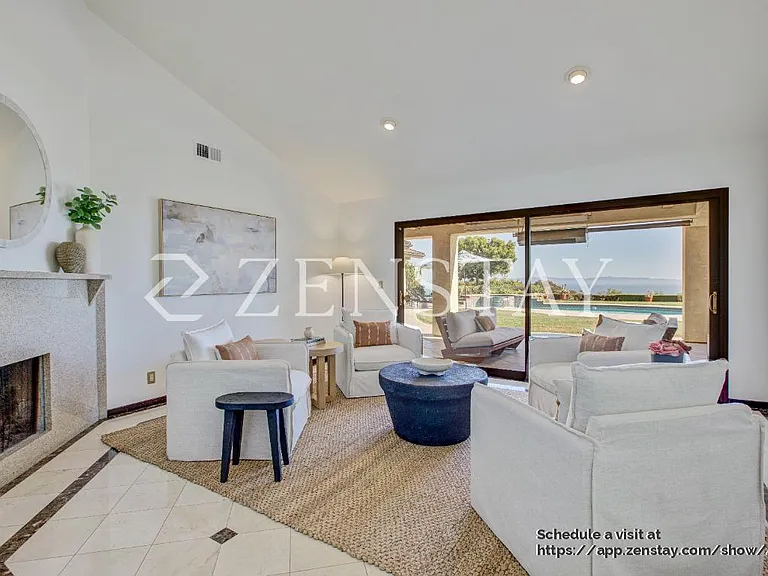 Sun-filled living area designed for comfort, gathering, and easy entertaining