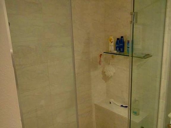 Custom walk-in shower enclosure.