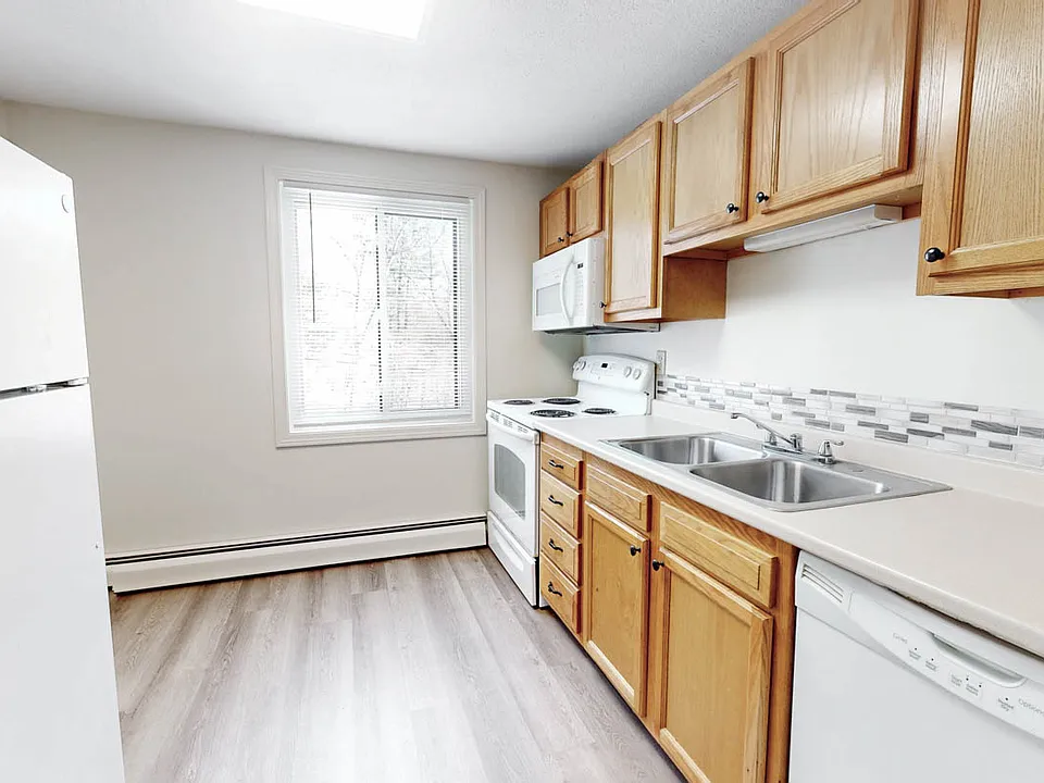 Designer Cabinets paired with contemporary hardware. Newer appliances with built in microwave. Sleek new Luxury vinyl plank flooring.