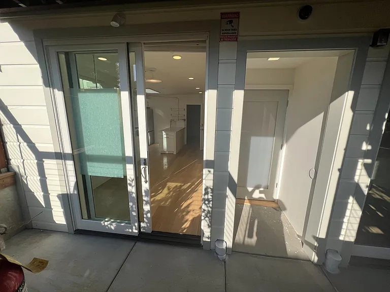 view of living area from yard (when doors are open)