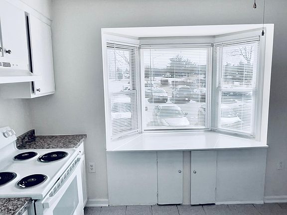 Bay window (under seat storage) looking out to front yard. House views Sudley Rd
