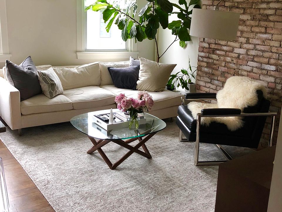 Living room with exposed brick