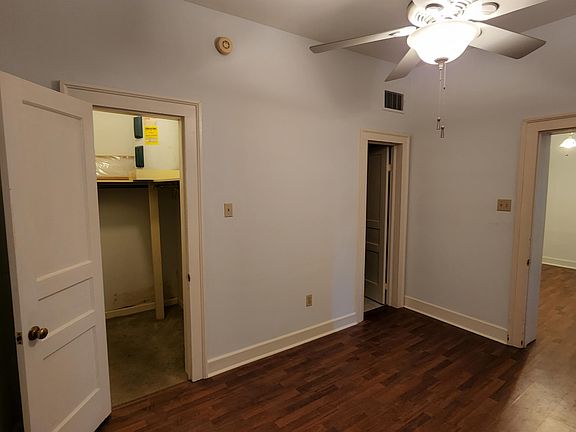 Bedroom showing walk-in closet