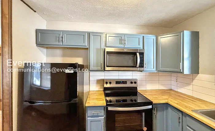 6933 Robinson Dr — Photo 4