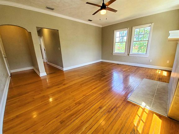 Large Living Area - tall ceilings with crown molding