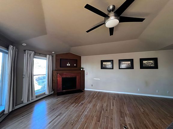 Main living area with gorgeous copper surround, gas fireplace