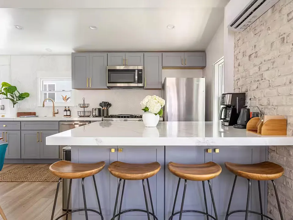 Top Floor - Fully equipped kitchen, complete with pots, pans, and utensils.