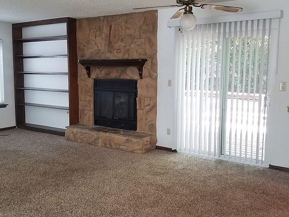 Built in bookcase. Propane Fireplace with blower. Can heat downstairs.