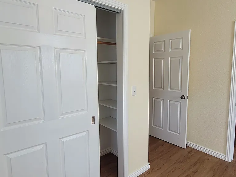 Master bedroom has a doorway directly into the bathroom. The door can be opened
