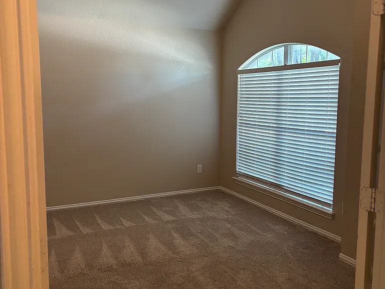 Office or 4th Bedroom. 12x13' New ceiling fan has been installed.