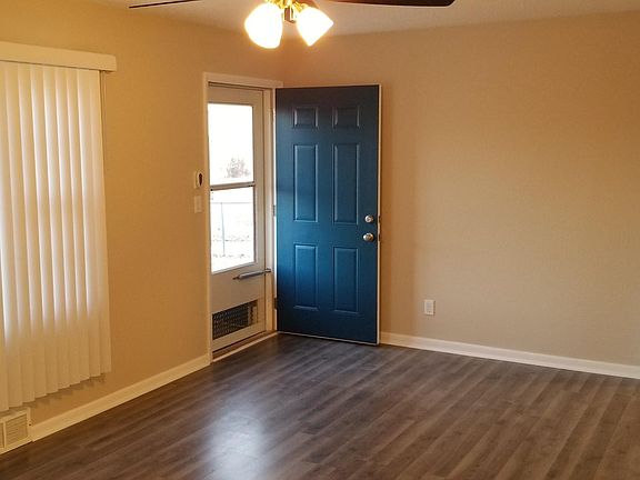 Living room south wall/ Front door