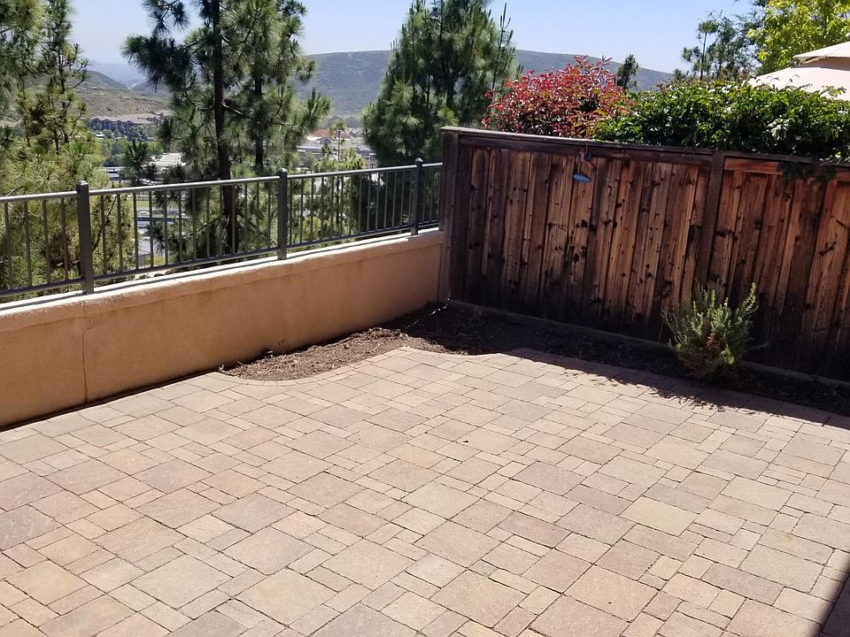 Backyard Patio with valley and ocean view. Unit is high enough to see beautiful Pacific Ocean most days.