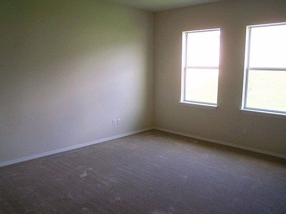 Master bedroom including walk-in closet