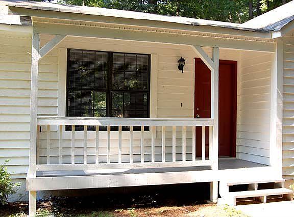 Welcoming Front Porch with Views of Woods