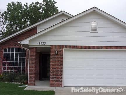 Front of House
						:
						Note solar screens on windows