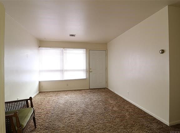 Formal living room from dining area