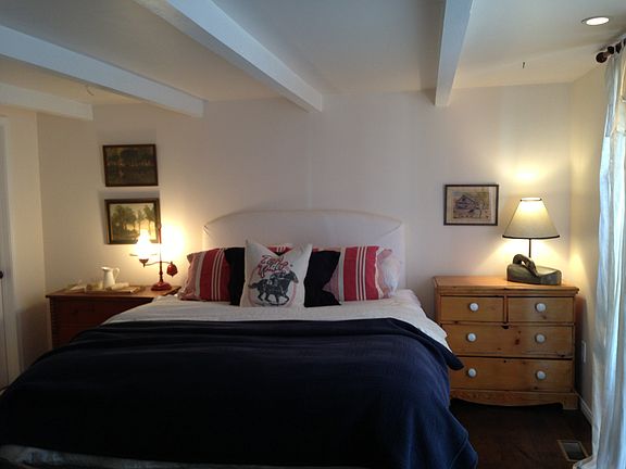 Master Bedroom with King bed, 42" Smart TV, On-Suite bathroom and slider to 700 sqft back deck.