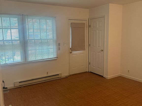 Bedroom on main floor with private full bath and in suite washer and dryer