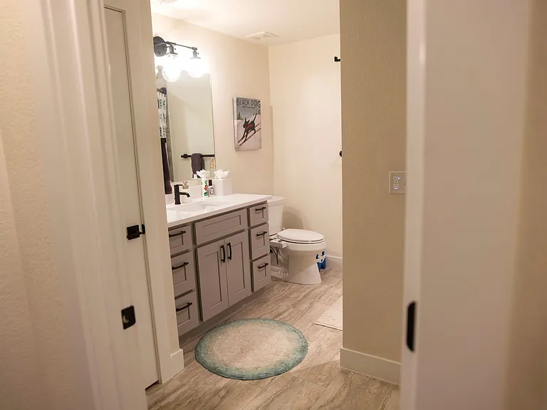 Basement bathroom with tub and shower.