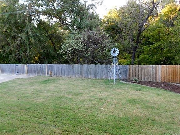 Backs to wooded greenbelt.  Peaceful setting is great to unwind.