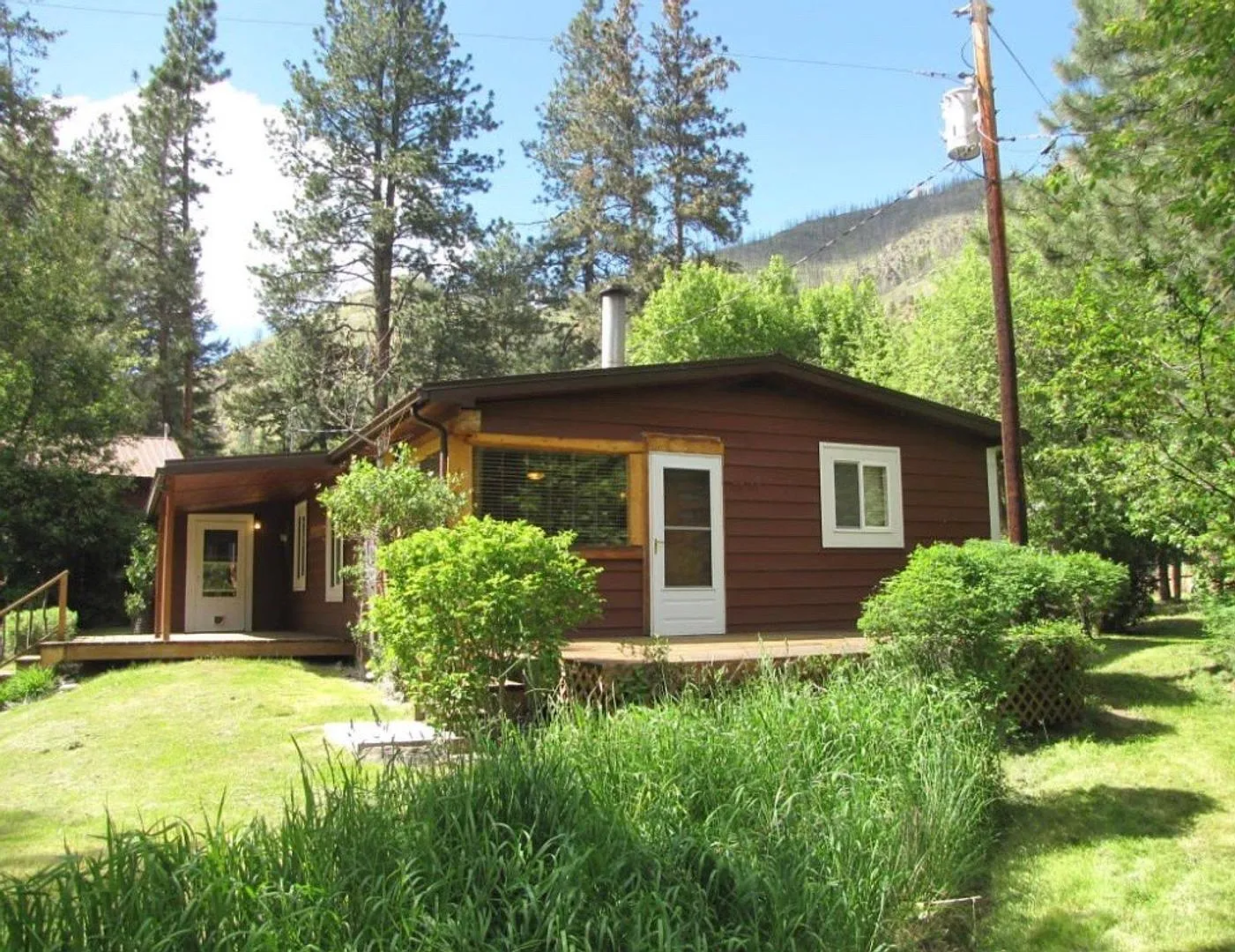 3-Bedroom Home on Lolo Creek with Private Decks & Bunkhouse — Photo 1