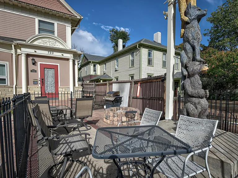 Outdoor seating and barbeque seating area, shared with other guests and tenants.