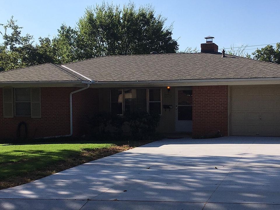 Front with new 2 car driveway