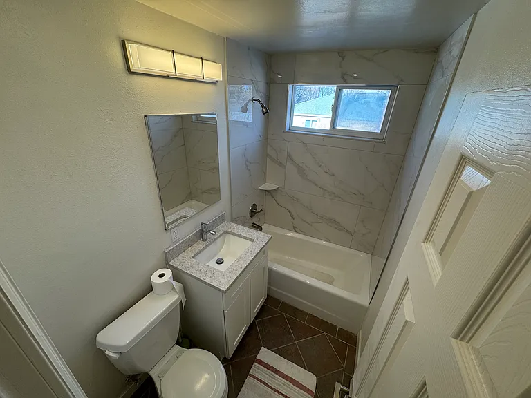 Common bathroom - located between 2nd and 3rd bedrooms