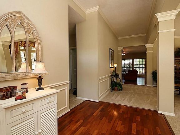 Step inside the fabulous entry and instantly feel the warmth and elegance of this fine home. Beautif