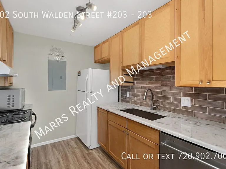 902 S Walden St #203 — Photo 16