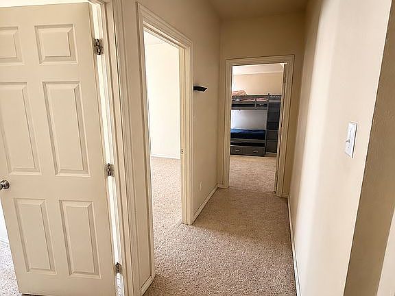 Hallway to 3 bedrooms
