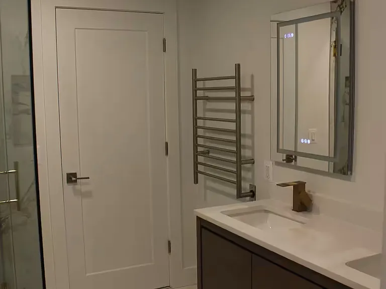 Heated towel rack and heated floors.